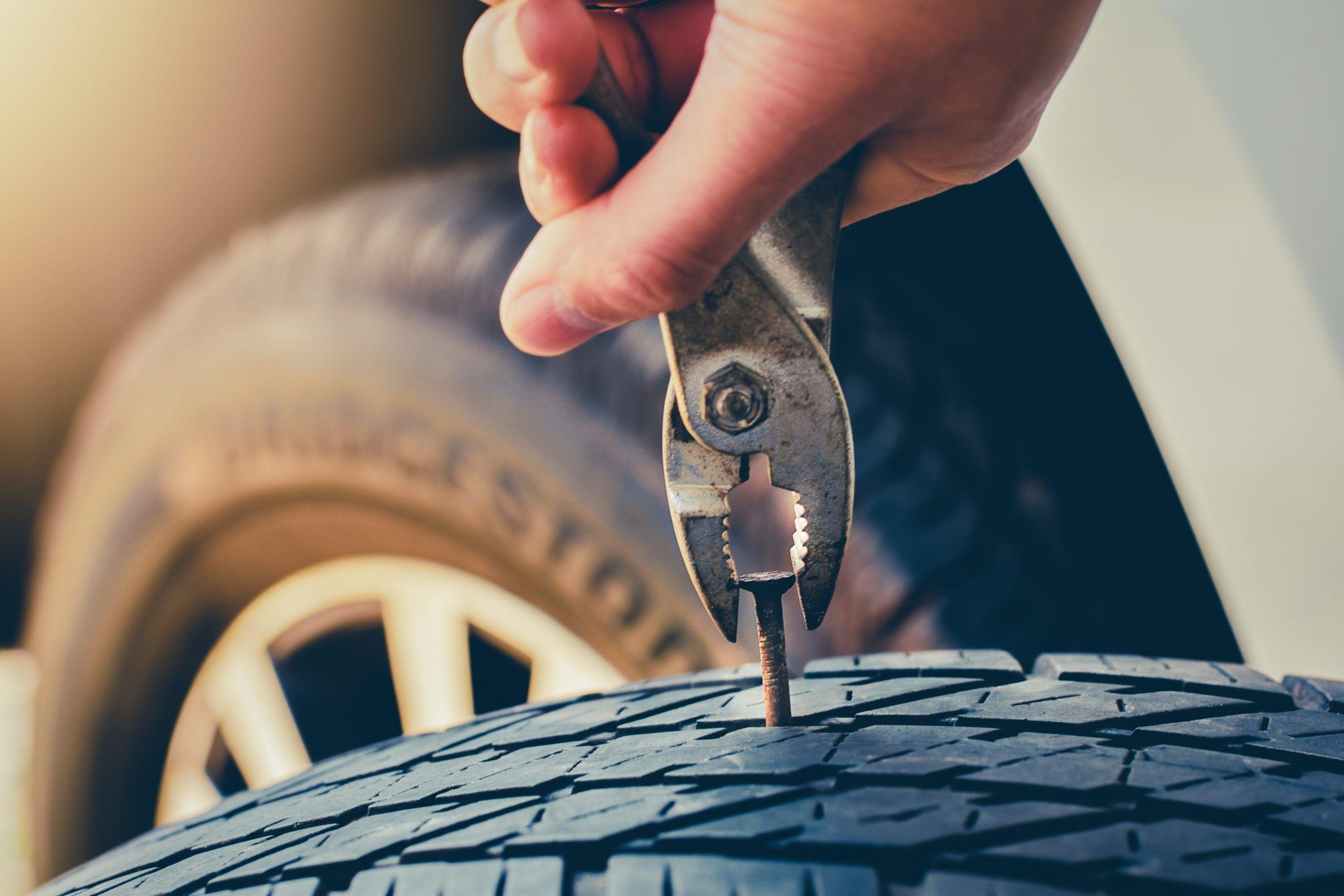 Technician fixing a tyre puncture in Dubai